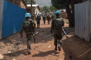 Soldiers with the United Nations stabilization mission in Central African Republic patrol in PK12 district, south of downtown Bangui, Central African Republic, on Jan. 13.