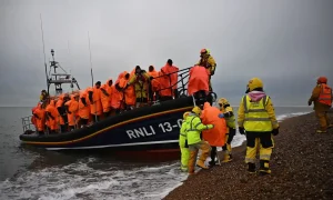People arrive on the southeast coast of England on 9 December 2022