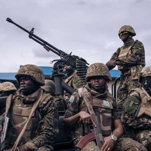 Kenyan and Congolese military personnel stand guard at the airport in Goma, eastern Democratic Republic of Congo, on November 15. PHOTO/AFP |